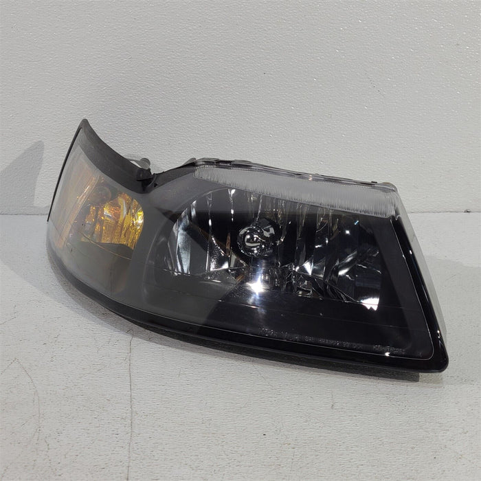 Aftermarket Eagle Eyes Passenger Headlight RH For 99-04 Ford Mustang AA7027